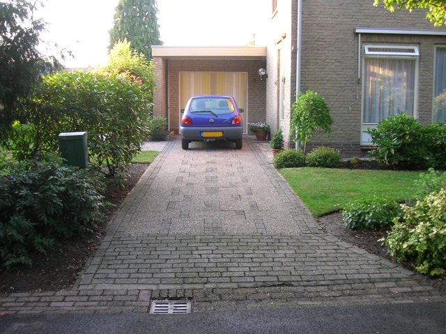 Infiltratiesystemen combineren met terras en oprit: zo voorkomt u verzakking en plassen